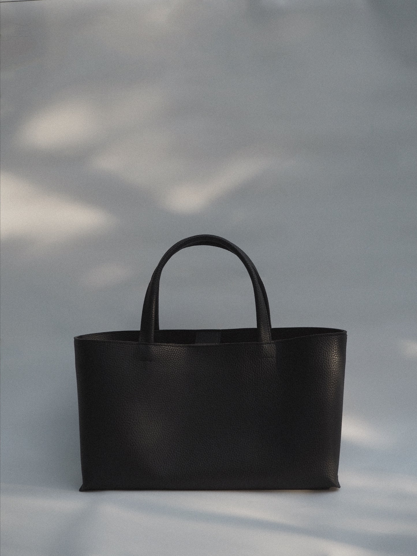 vegan leather oblong bag