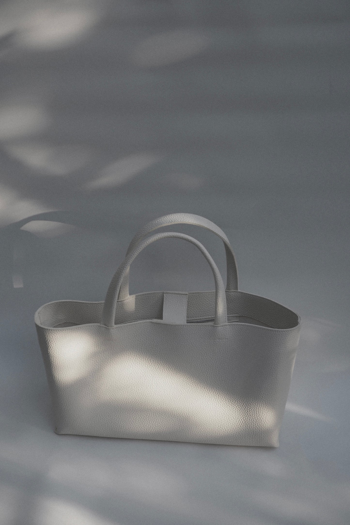 vegan leather oblong bag